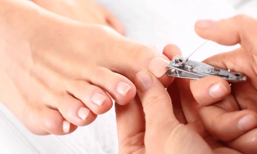 Healthy toenails being trimmed
